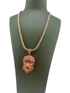 14kt gold ice chain and Jesus pendant